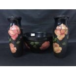 PAIR OF LACQUERED VASES of tapering form with waisted neck,