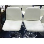 PAIR OF CONTEMPORARY CREAM LEATHER BAR STOOLS