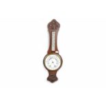 EDWARDIAN WHEEL BAROMETER AND THERMOMETER with opaque white glass dials,