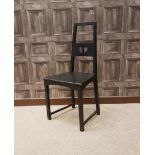 EBONISED OAK BEDROOM CHAIR IN THE MANNER OF CHARLES RENNIE MACKINTOSH the tapering back with a