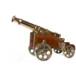 19TH CENTURY BRONZE SIGNAL CANNON ringed barrel with flared muzzle, globular cascabel,