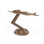 BRONZE AEROPLANE MASCOT on a circular base, GEC made in England to base,