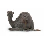 VICTORIAN NOVELTY INKWELL in the form of a resting camel with coconut shell body,