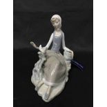 LLADRO FIGURE OF A SEATED WOMAN WITH A DOVE