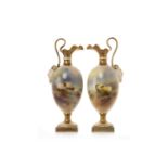 PAIR OF ROYAL WORCESTER EWERS both of footed ovoid form, with scalloped rim,