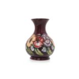 CONTEMPORARY MOORCROFT 'PANSY' PATTERN VASE of squat baluster form,