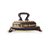 ROYAL CROWN DERBY 'IMARI' PATTERN MINIATURE FLAT IRON AND STAND decorated in the 6299 pattern,