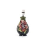 MOORCROFT 'HIBISCUS' PATTERN TABLE LAMP of baluster form,