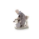 ROYAL COPENHAGEN FIGURE GROUP OF A MILKMAID AND CALF model 779,