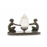 ART DECO BRONZED SPELTER FIGURAL TABLE LAMP modelled as two kneeling ladies,