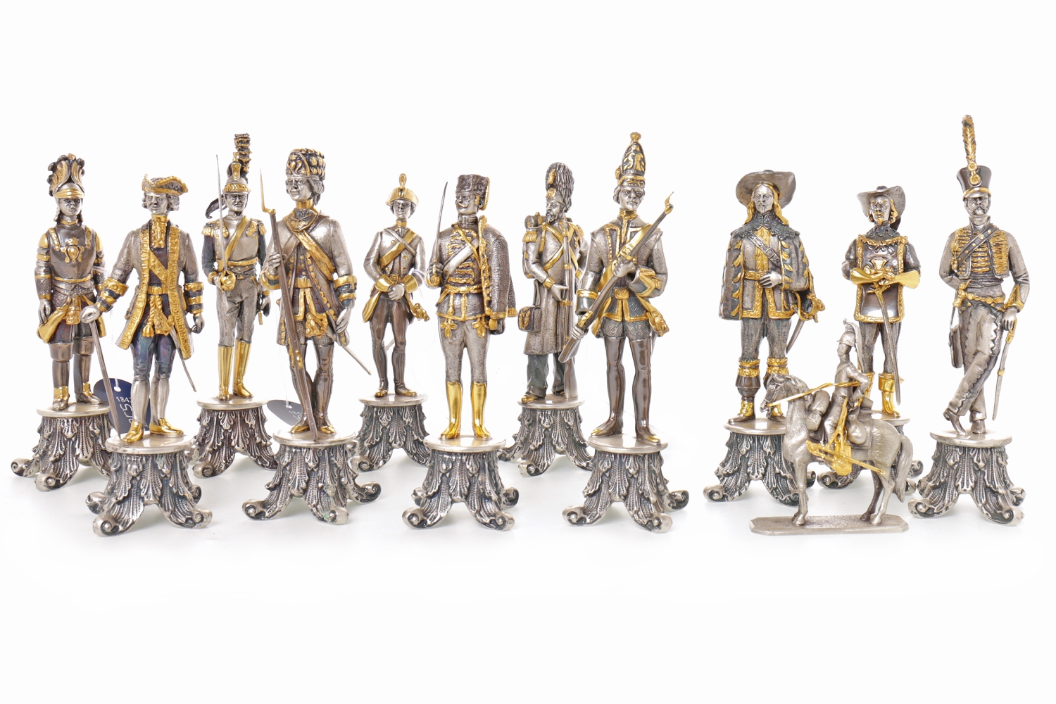 GROUP OF ELEVEN MODERN ITALIAN GILDED WHITE METAL MILITARY FIGURES depicting uniformed figures from