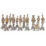 GROUP OF ELEVEN MODERN ITALIAN GILDED WHITE METAL MILITARY FIGURES depicting uniformed figures from