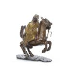 IN THE MANNER OF BERGMAN - COLD PAINTED BRONZE FIGURE OF AN ARAB ON HORSEBACK modelled with the