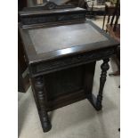 EDWARDIAN MAHOGANY DAVENPORT WRITING DESK the raised back with hinged cover enclosing a fitted