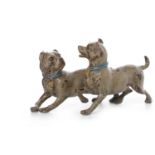 IN THE MANNER OF BERGMAN - COLD PAINTED BRONZE GROUP OF TWO MASTIFFS modelled running playfully