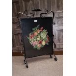 ARTS & CRAFTS WROUGHT METAL AND HAMMERED COPPER FIRESCREEN inset with a later needlework panel of