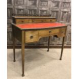 MAHOGANY BOW FRONT WRITING DESK OF GEORGE III DESIGN the concave raised back with fretted cresting,