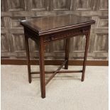 EDWARDIAN MAHOGANY OBLONG FOLD OVER CARD TABLE with blind fretted long frieze drawer,