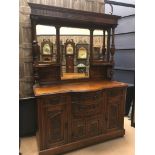 VICTORIAN CARVED OAK MIRROR BACK SIDEBOARD the lofty moulded cornice with three bevelled mirrors