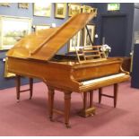 BOUDOIR GRAND PIANO by BLUTHNER contained in a rosewood case,
