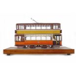 MODEL GLASGOW STANDARD TRAMCAR IN GLAZED CASE in orange, yellow and burgundy,