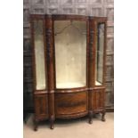 ATTRACTIVE MAHOGANY DISPLAY CABINET OF CHIPPENDALE DESIGN the top with knulled border,