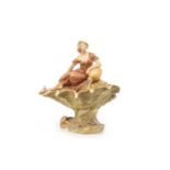 ROYAL DUX FIGURAL CENTREPIECE modelled as classical young maiden sitting, on a conch shell,