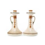 PAIR OF ROYAL DOULTON 'MERRIVALE' PATTERN CHAMBERSTICKS with fixed drip pan above a hooped handle