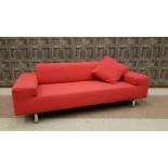 ARFLEX 'MOODS' DESIGNER THREE SEAT SOFA upholstered in a scarlet weave, on aluminium supports,