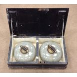 PAIR OF LATE 19TH CENTURY CURLING STONES both of grey granite, approximately 28cm diameter,