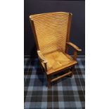 OAK FRAMED ORKNEY CHAIR of standard design, with a detachable lift out seat, on square tapered legs,