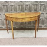 REGENCY MAHOGANY AND SATINWOOD BANDED 'D' SHAPED FOLD OVER TEA TABLE the top inset a fielded burr