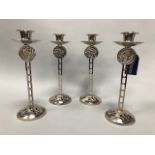 A SET OF FOUR GLASGOW ROSE CANDLESTICKS