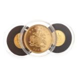 A GOLD BARBADOS TEN DOLLAR COIN AND TWO OTHERS