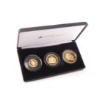 A GOLD THREE POUND COIN SET