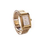 A LADY'S LONGINES EIGHTEEN CARAT GOLD QUARTZ WRIST WATCH