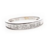 A DIAMOND HALF ETERNITY RING