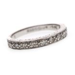 A DIAMOND HALF ETERNITY RING