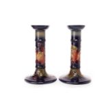 A PAIR OF MODERN MOORCROFT CANDLESTICKS