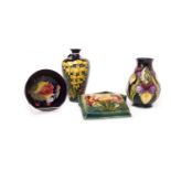 TWO MOORCROFT VASES, A MOORCROFT JAR AND A MOORCROFT BOWL