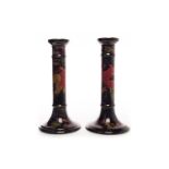 A PAIR OF MOORCROFT CANDLESTICKS