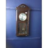 AN EDWARDIAN WALL CLOCK