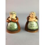 A PAIR OF FIGURAL ROYAL DOULTON SALT AND PEPPER SHAKERS