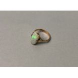 AN OPAL RING WITH COIN FOB AND A PAIR OF CUFFLINKS