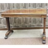 A ROSEWOOD OBLONG LIBRARY TABLE