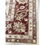 A ZIEGLER BORDERED CARPET