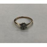 A DIAMOND SET FLOWER CLUSTER RING