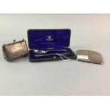 A SILVER FORK AND SPOON SET, PURSE AND A CIGARETTE CASE