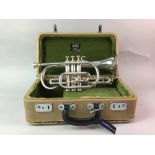 A VINTAGE SILVER PLATED TRUMPET IN CASE