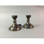 A LOT OF TWO SILVER DWARF CANDLESTICKS